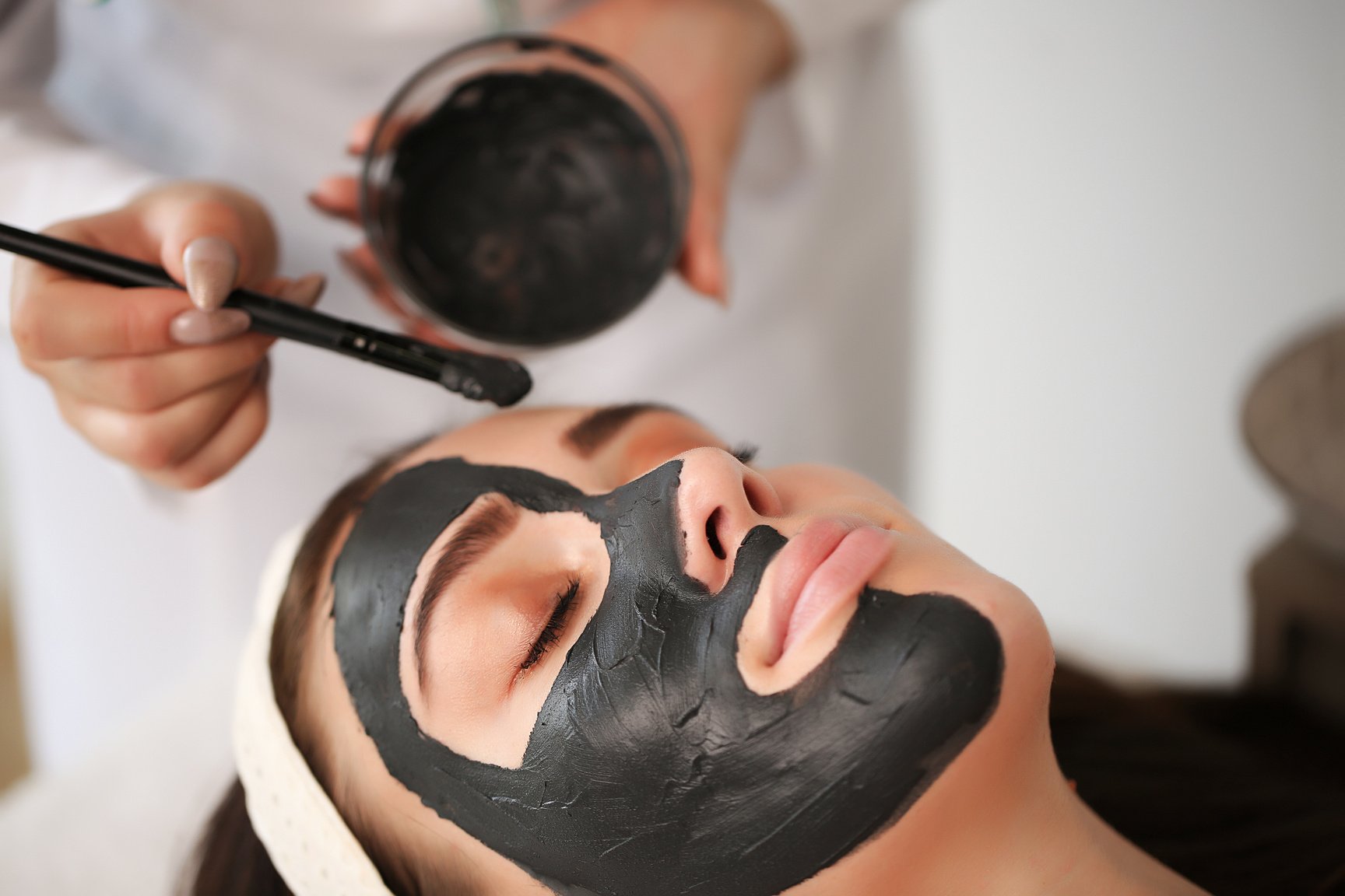 Woman Getting Facial Treatment