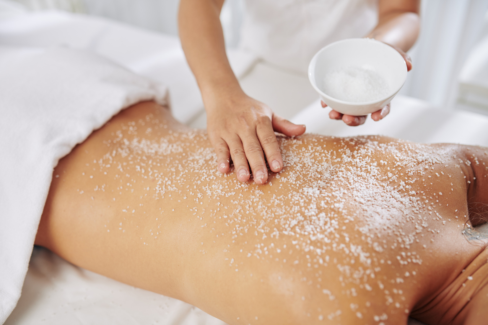 Woman Getting Exfoliating Treatment